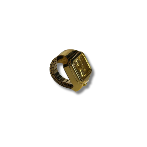 Gold ring with a rectangular gemstone on a white background